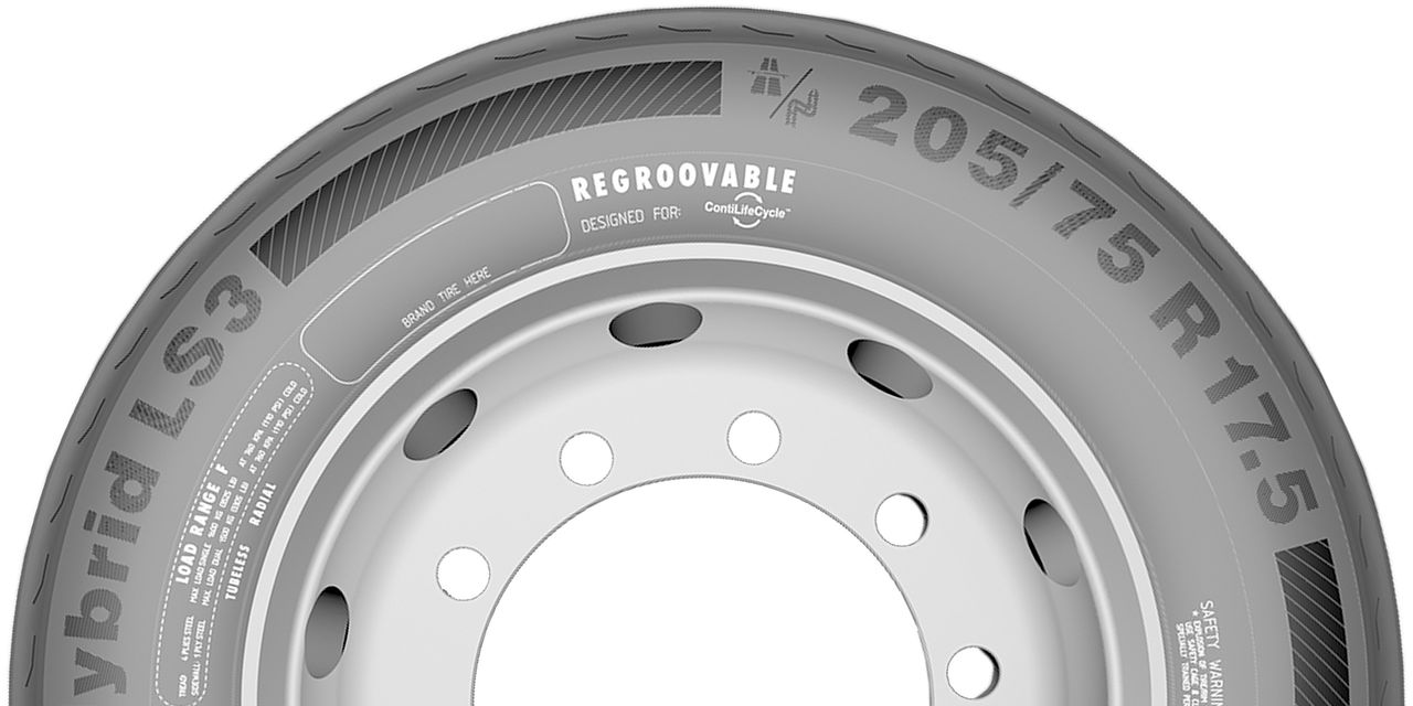 A marking on a truck tyre indicating the regroovability of the tyre